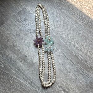 Elegant Pearl Necklace with Floral Accents